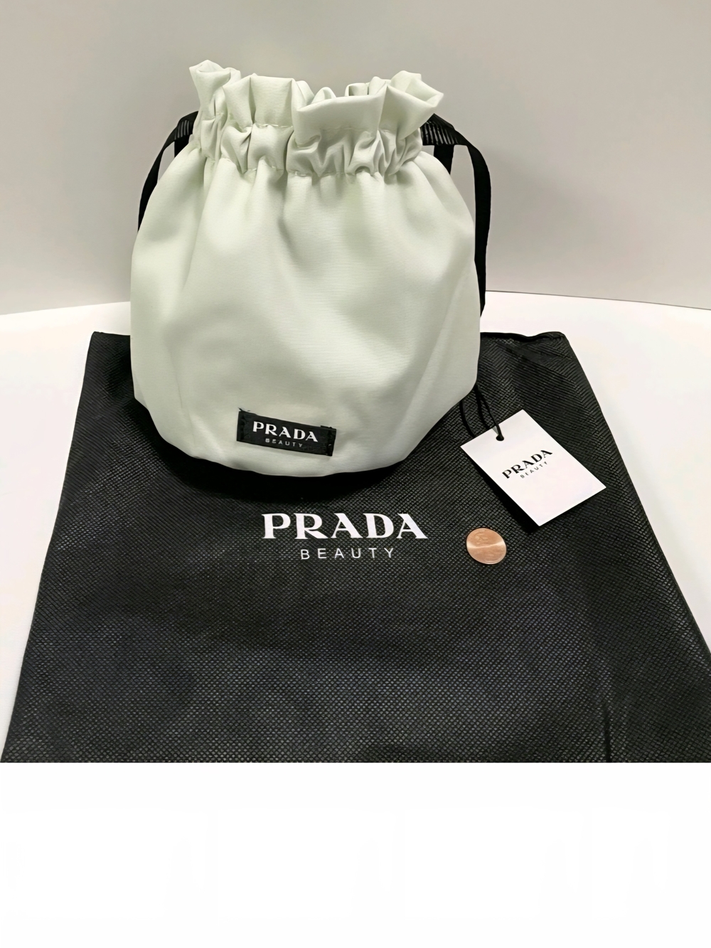 Prada Cream Drawstring Beauty Pouch with Black Accents